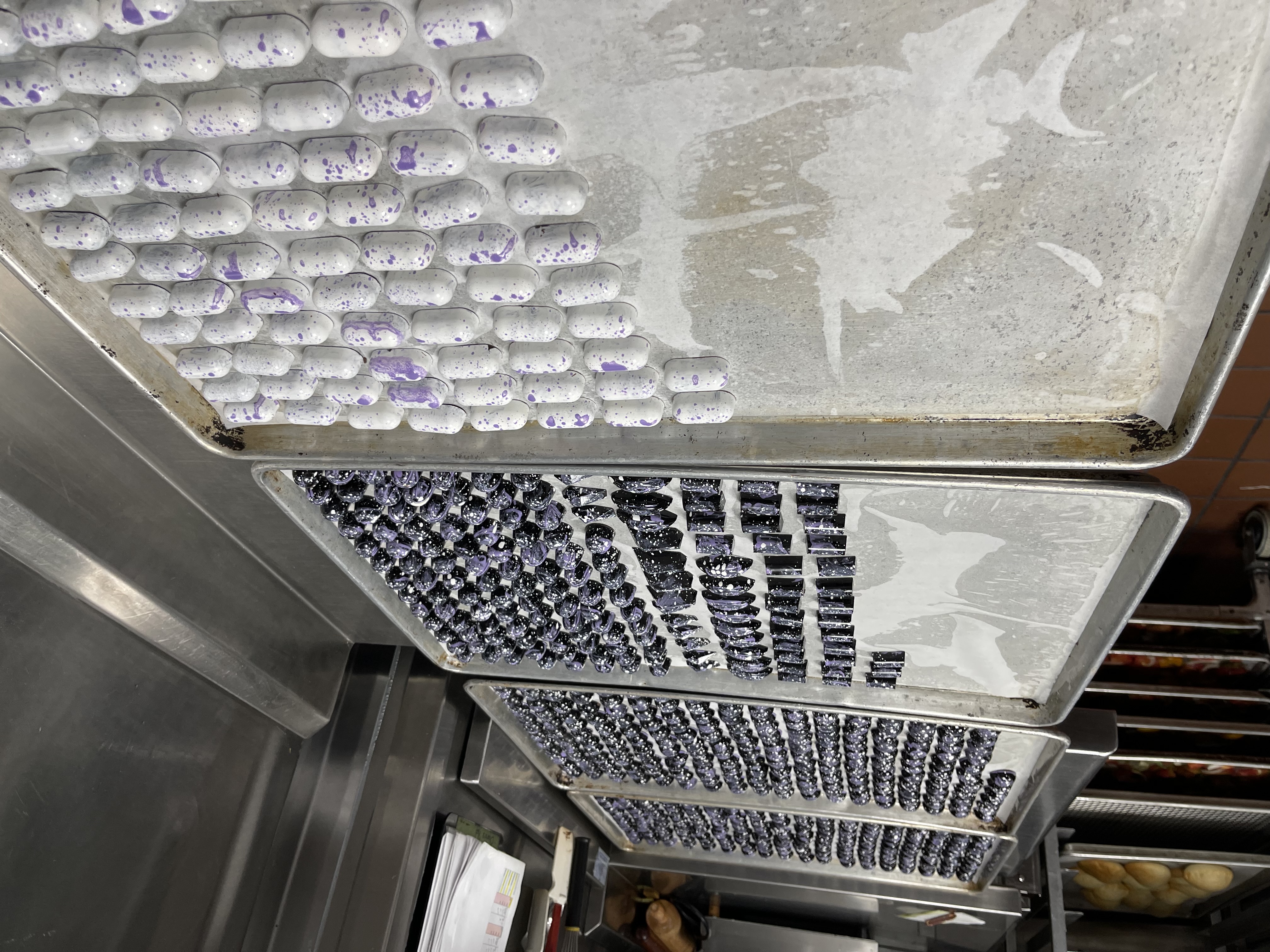 Hand-painted bonbon with cocoa butter design